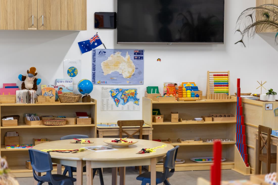 The Kindy room with world maps and learning materials